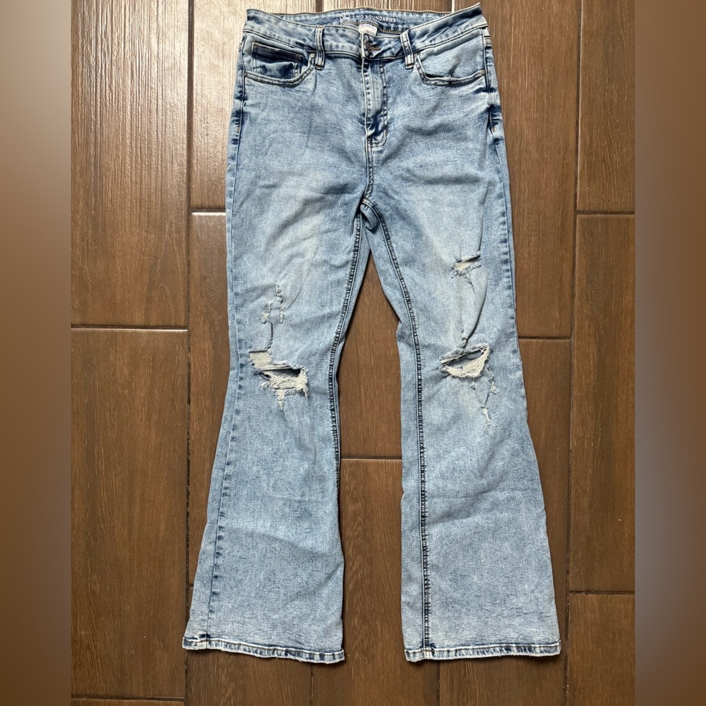 Acid washed distressed flare jeans